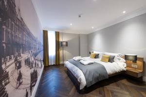 Postel nebo postele na pokoji v ubytování Claremont Hotel