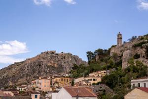 a view of a town with a mountain at Gambello Luxury Rooms in Nafplio