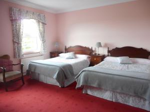 Postel nebo postele na pokoji v ubytování Springfield House B&B + 28 fotografií