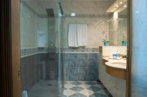 a bathroom with a shower and a sink at Villa Els Pins in Palma de Mallorca +30 photos