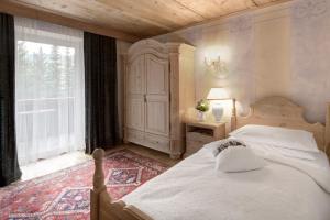 Posteľ alebo postele v izbe v ubytovaní Hotel La Perla: The Leading Hotels of the World