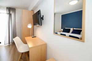 TV a/nebo společenská místnost v ubytování Beach Rooms Split