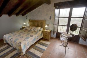 Postel nebo postele na pokoji v ubytování Casas Herrenales de Ulaca + 31 fotografií
