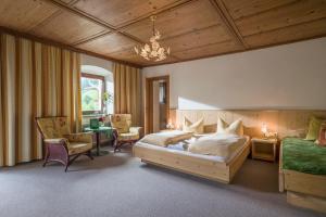 Postel nebo postele na pokoji v ubytování Ferienhof Kampfl + 37 fotografií