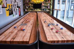 a bowling alley with wooden lanes in a room at Generator Copenhagen in Copenhagen