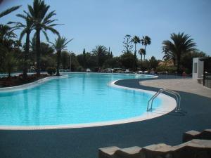 Bazén v ubytování Sun Club Bungalows nebo v jeho okolí