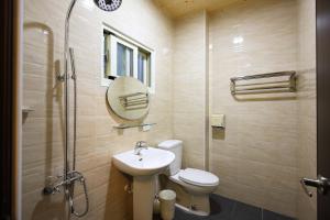 Koupelna v ubytování Xincheng Old Street B&B