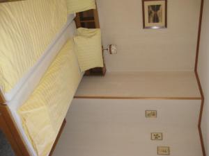 Postel nebo postele na pokoji v ubytování Hotel Pension Spycher