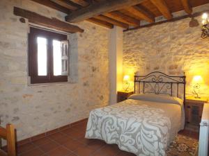Posteľ alebo postele v izbe v ubytovaní Las Casas del Duraton