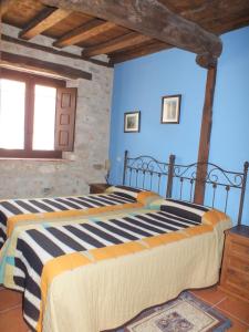 Posteľ alebo postele v izbe v ubytovaní Las Casas del Duraton
