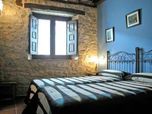 Posteľ alebo postele v izbe v ubytovaní Las Casas del Duraton
