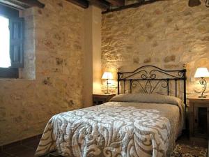 Posteľ alebo postele v izbe v ubytovaní Las Casas del Duraton