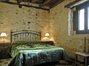 Posteľ alebo postele v izbe v ubytovaní Las Casas del Duraton