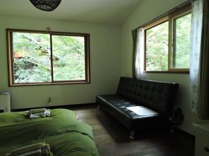 Istumisnurk majutusasutuses Momiji Guesthouse Cottages - Alpine Route