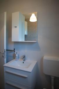 Kylpyhuone majoituspaikassa Apartment Bibo