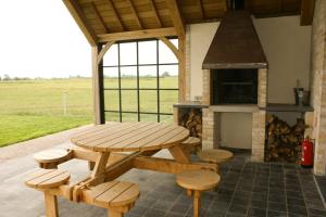 Barbecuefaciliteiten beschikbaar voor gasten van het vakantiehuis