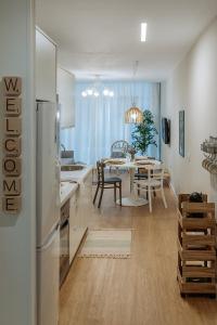 TV a/nebo společenská místnost v ubytování MYA home General Vives