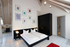 Art Hotel Weimarにあるベッド