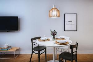 TV a/nebo společenská místnost v ubytování MYA home General Vives