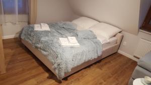 Postel nebo postele na pokoji v ubytování Vigan Apartamenty