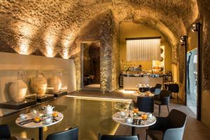 A seating area at Villa Gervasio Rooms