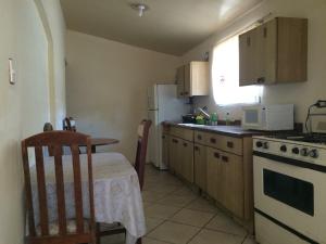 A kitchen or kitchenette at Blanquita guesthouse
