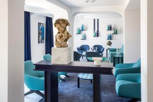 A seating area at Villa Gervasio Rooms