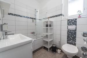 Ein Badezimmer in der Unterkunft Family-Apartments Freiburg
