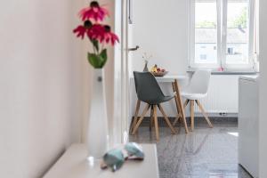 Ein Sitzbereich in der Unterkunft Family-Apartments Freiburg