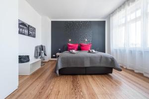 Ein Bett oder Betten in einem Zimmer der Unterkunft Family-Apartments Freiburg