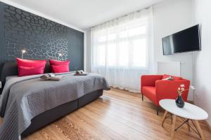 TV/Unterhaltungsangebot in der Unterkunft Family-Apartments Freiburg