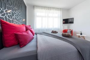 Ein Bett oder Betten in einem Zimmer der Unterkunft Family-Apartments Freiburg