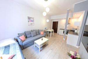 Kuchyňa alebo kuchynka v ubytovaní Apartamenty Zamkowa