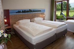 Кровать или кровати в номере Haus Waldesruh
