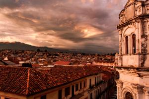 an old building with a view of a city at Check Inn Bed and Breakfast in Cuenca