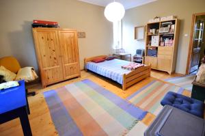 Ένα ή περισσότερα κρεβάτια σε δωμάτιο στο Apartament Krych