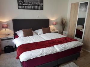 Postel nebo postele na pokoji v ubytování Hotel Eigelstein