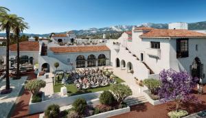an overhead view of a group of people sitting in the courtyard of a building at Hotel Californian in Santa Barbara