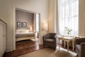 Postel nebo postele na pokoji v ubytování Auberge Saint-Pierre + 16 fotografií