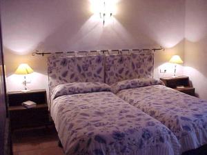 Katil atau katil-katil dalam bilik di Casa Rural EL Trillo