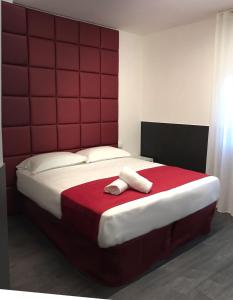Postel nebo postele na pokoji v ubytování Hotel Pex Padova