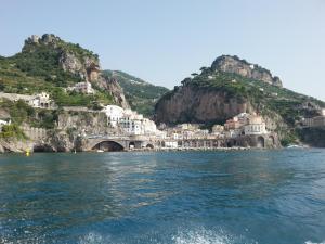 a view of the amalfi coast from the water at Il Covo delle Civette in Vietri sul Mare