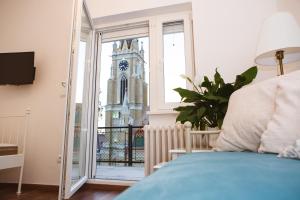 Voodi või voodid majutusasutuse NS center apartment toas +25 fotot