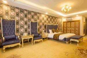 Postel nebo postele na pokoji v ubytování Anh Nguyet Hotel