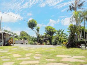 גינה חיצונית ב-Qing Taoyuan Homestay