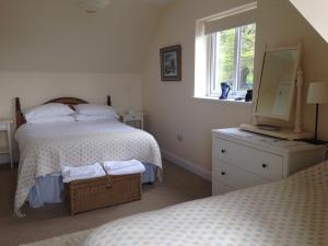 Llit o llits en una habitació de Tigh Uisdean Bed and Breakfast