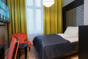 Postel nebo postele na pokoji v ubytování Thon Hotel Spectrum