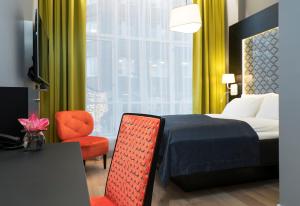 Postel nebo postele na pokoji v ubytování Thon Hotel Spectrum