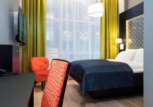 Postel nebo postele na pokoji v ubytování Thon Hotel Spectrum