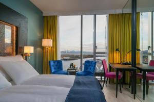 Postel nebo postele na pokoji v ubytování Thon Hotel Lofoten